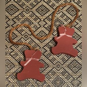 Vintage Two Wood Teddy Bears attached with rope.
